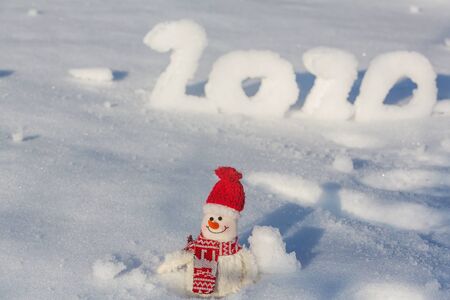 Pretty Snowman on snowy New Year 2020  date background