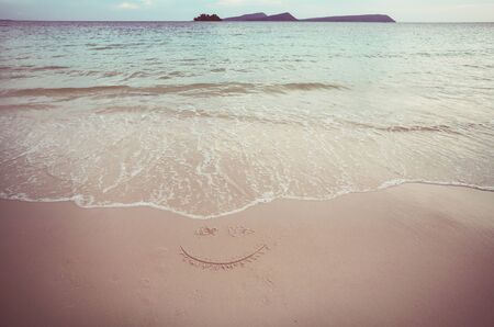 Sandy beach in ocean coast. Travel background.の写真素材