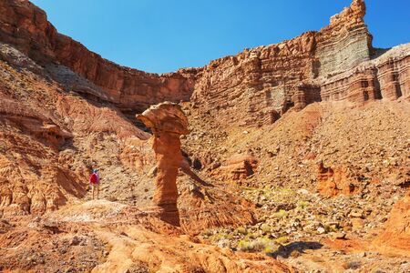 Hike in the Utah mountains. Hiking in unusual natural landscapes. Fantastic forms sandstone formations.の写真素材