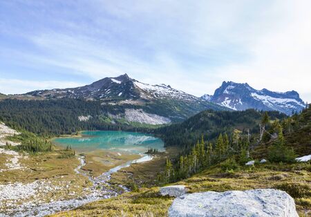 Serenity lake in the mountains in summer season. Beautiful natural landscapes.の写真素材