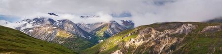 Picturesque Mountains of Alaska in summer. Snow covered massifs, glaciers and rocky peaks.の写真素材