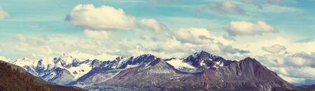 Picturesque Mountains of Alaska in summer. Snow covered massifs, glaciers and rocky peaks.の写真素材