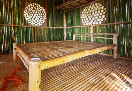 Green bamboo hut in tropical islandの写真素材
