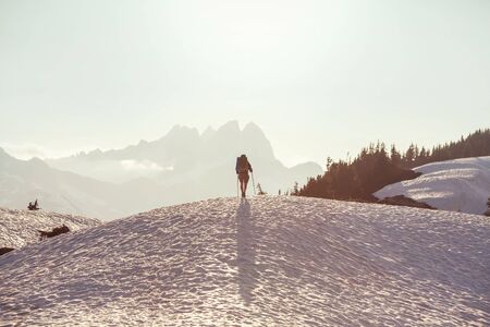 Backpacker in hike in the autumn mountainsの写真素材