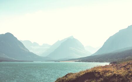 Picturesque rocky peaks of the Glacier National Park, Montana, USA. Beautiful natural landscapes.
