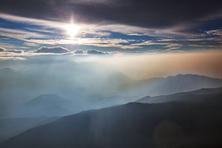 Mountains silhouette at sunrise. Beautiful natural background.