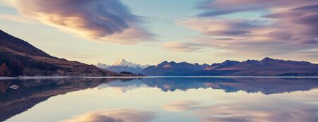 Amazing natural landscapes in New Zealand. Mountains lake at sunset.の写真素材