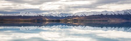 Amazing natural landscapes in New Zealand. Mountains lake at sunset.の写真素材