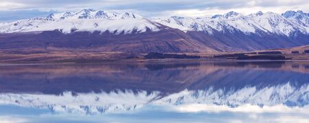 Amazing natural landscapes in New Zealand. Mountains lake at sunset.の写真素材