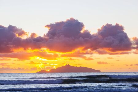 Beautiful Sunset at the Ocean Beach, New Zealand. Inspiring natural and travel backgroundの写真素材