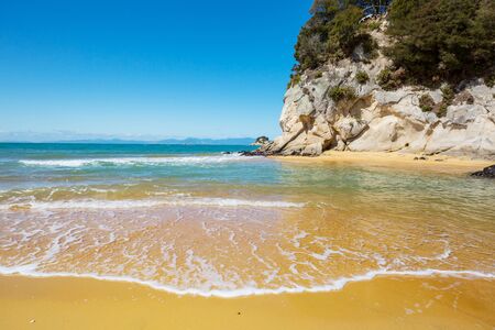 Beautiful Sunset at the Ocean Beach, New Zealand. Inspiring natural and travel backgroundの写真素材