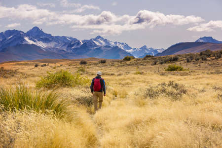 Backpacker in hike in the high mountainsの写真素材