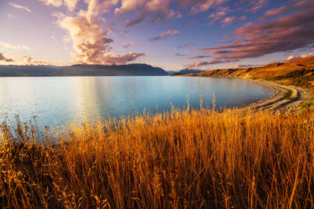 Amazing natural landscapes in New Zealand. Mountains lake at sunset.の写真素材