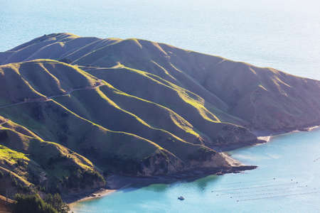 Beautiful Sunset at the Ocean Beach, New Zealand. Inspiring natural and travel backgroundの写真素材