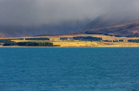 Amazing natural landscapes in New Zealand. Mountains lake at sunset.