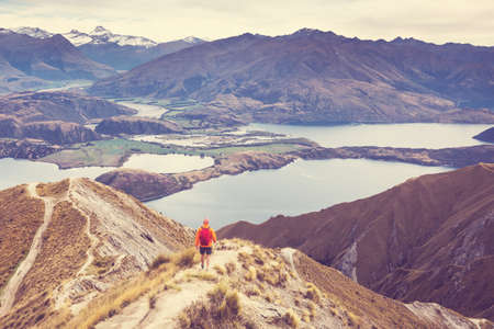 Traveler hiking in Roys Peak. New Zealand. Lake Wanakaの写真素材