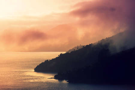 Beautiful Sunset at the Ocean Beach, New Zealand. Inspiring natural and travel background