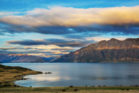 Amazing natural landscapes in New Zealand. Mountains lake at sunset.の写真素材