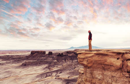 Hike in the Utah mountains. Hiking in unusual natural landscapes. Fantastic forms sandstone formations.の写真素材