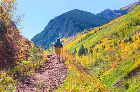 Hike in the autumn mountains. Fall season theme.の写真素材