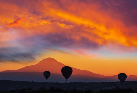 Colorful hot air balloons  in Goreme national park, Cappadocia, Turkey. Famous touristic attraction.の写真素材