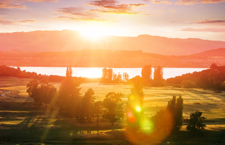 Beautiful rural  landscape of the New Zealand at sunriseの写真素材