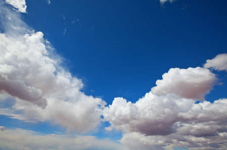 Sunny background, blue sky with white clouds, natural background.の写真素材