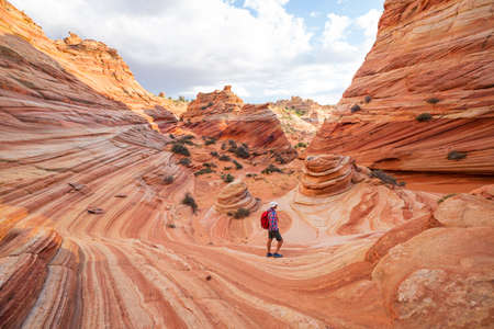 Hike in the Utah mountains. Hiking in unusual natural landscapes. Fantastic forms sandstone formations.の写真素材