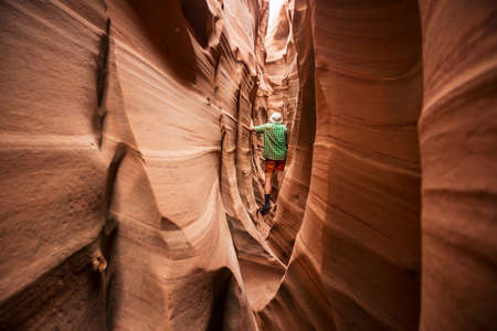 Slot canyon in Grand Staircase Escalante National park, Utah, USA. Unusual colorful sandstone formations in deserts of Utah are popular destination for hikers.の写真素材