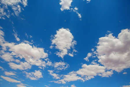 Sunny background, blue sky with white clouds, natural background.の写真素材