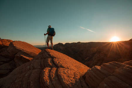 Hike in the Utah mountains. Hiking in unusual natural landscapes. Fantastic forms sandstone formations.の写真素材