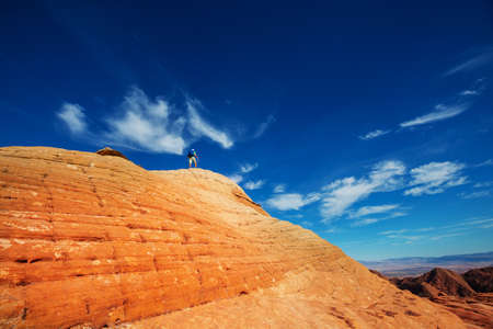 Hike in the Utah mountains. Hiking in unusual natural landscapes. Fantastic forms sandstone formations.の写真素材