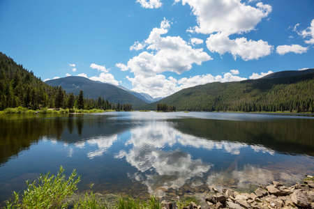 Serenity lake in the mountains in summer season. Beautiful natural landscapes.の写真素材
