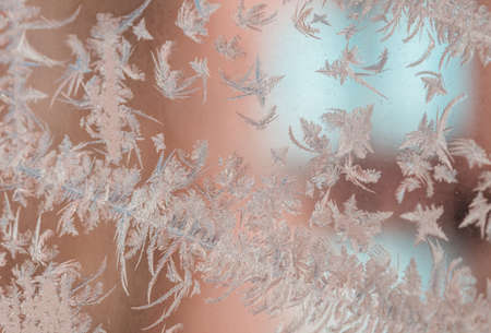 Frozen window. Crystals on a frozen window. Christmas background.の写真素材