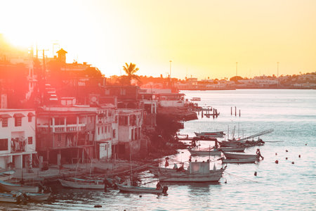 A colonial fishing town in Mexico at sunsetの写真素材