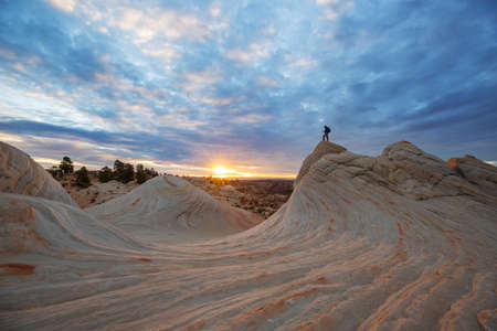 Hike in the Utah mountains. Hiking in unusual natural landscapes. Fantastic forms sandstone formations.の写真素材