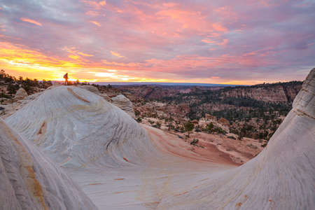 Hike in the Utah mountains. Hiking in unusual natural landscapes. Fantastic forms sandstone formations.の写真素材