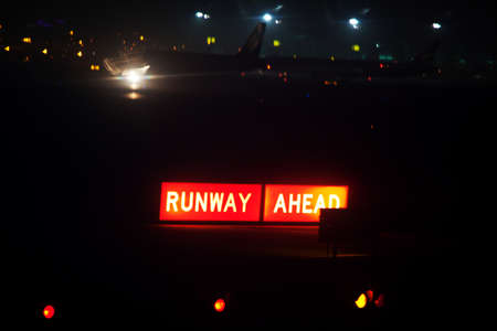 Landing lights at night closeup in airportの写真素材