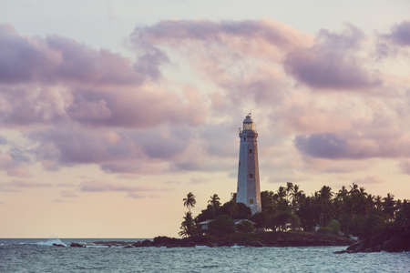 View of lighthouse Dondra and lights at sunset Matara, Sri Lanka.の写真素材