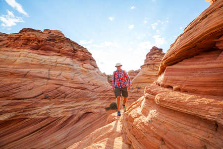 Hike in the Utah mountains. Hiking in unusual natural landscapes. Fantastic forms sandstone formations.の写真素材