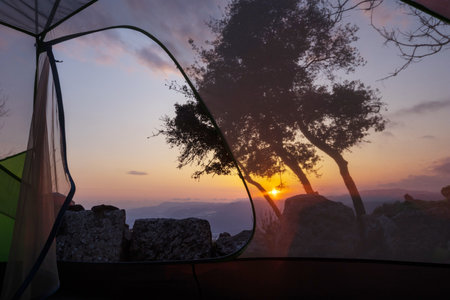 Hiking tent in the mountains in summer seasonの写真素材