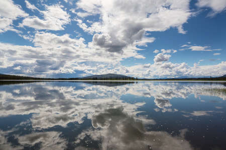 Serene scene by the mountain lake in Canada