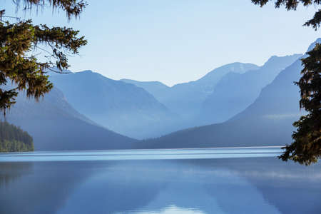 Beautiful Bowman lake with reflection of the spectacular mountains in Glacier National Park,...