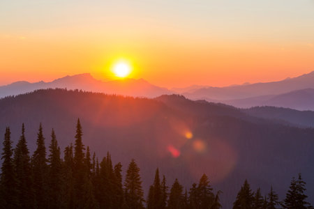 Scenic Sunset in the mountains. Beautiful natural background.の写真素材