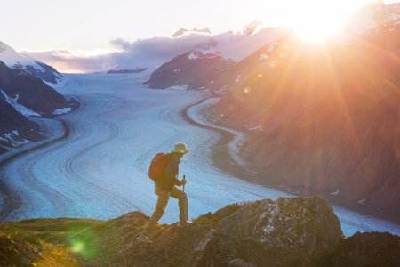 Hiking man in Canadian mountains. Hike is the popular recreation activity in North America. There are a lot of picturesque trails.の写真素材