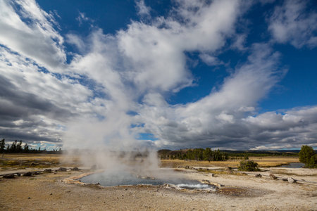 Inspiring natural background. Pools and  geysers  fields  in Yellowstone National Park, USA.の写真素材