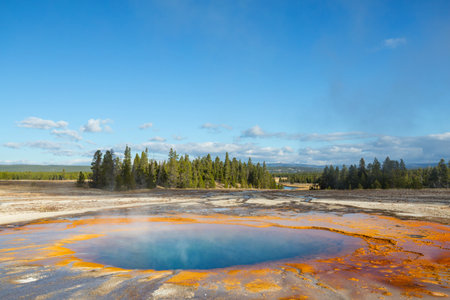 Inspiring natural background. Pools and  geysers  fields  in Yellowstone National Park, USA.の写真素材