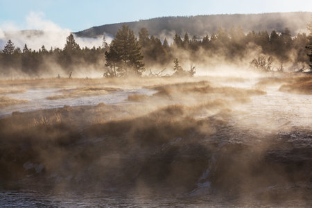 Inspiring natural background. Pools and  geysers  fields  in Yellowstone National Park, USA.の写真素材