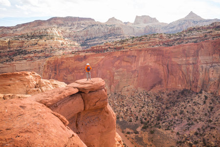Hike in the Utah mountains. Hiking in unusual natural landscapes. Fantastic forms sandstone formations.の写真素材