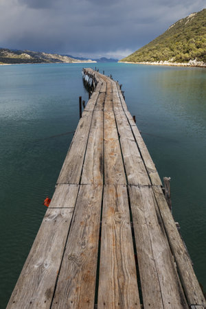 pier on the lake at sunriseの写真素材